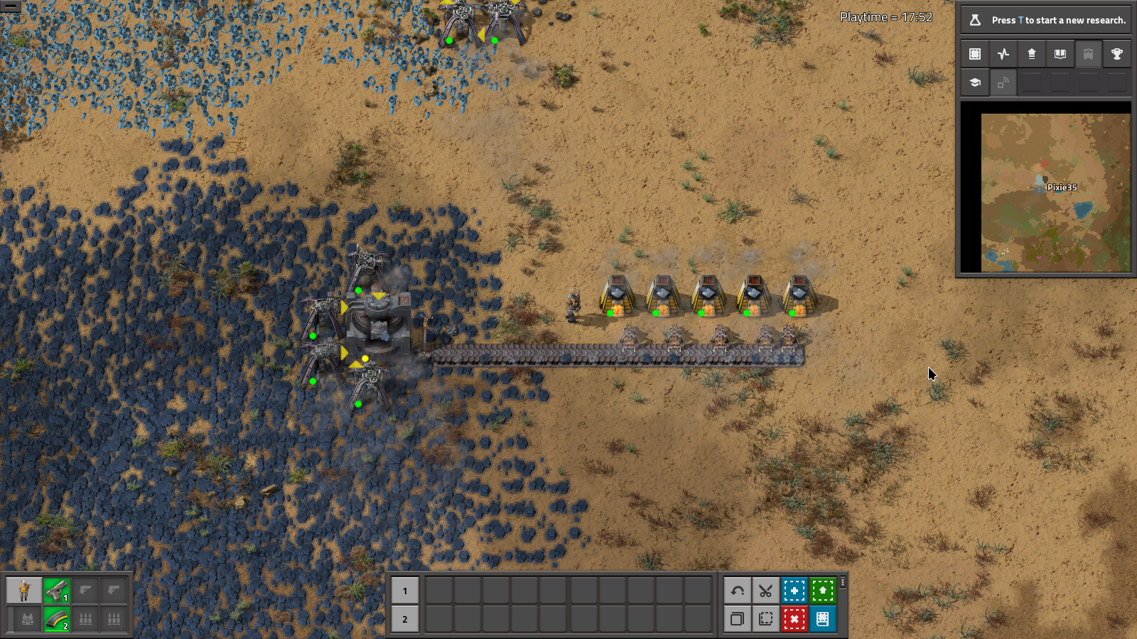 A single belt with five furnaces, being fed by burner inserters.